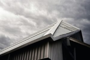 House exterior showing roof and gutter lines
